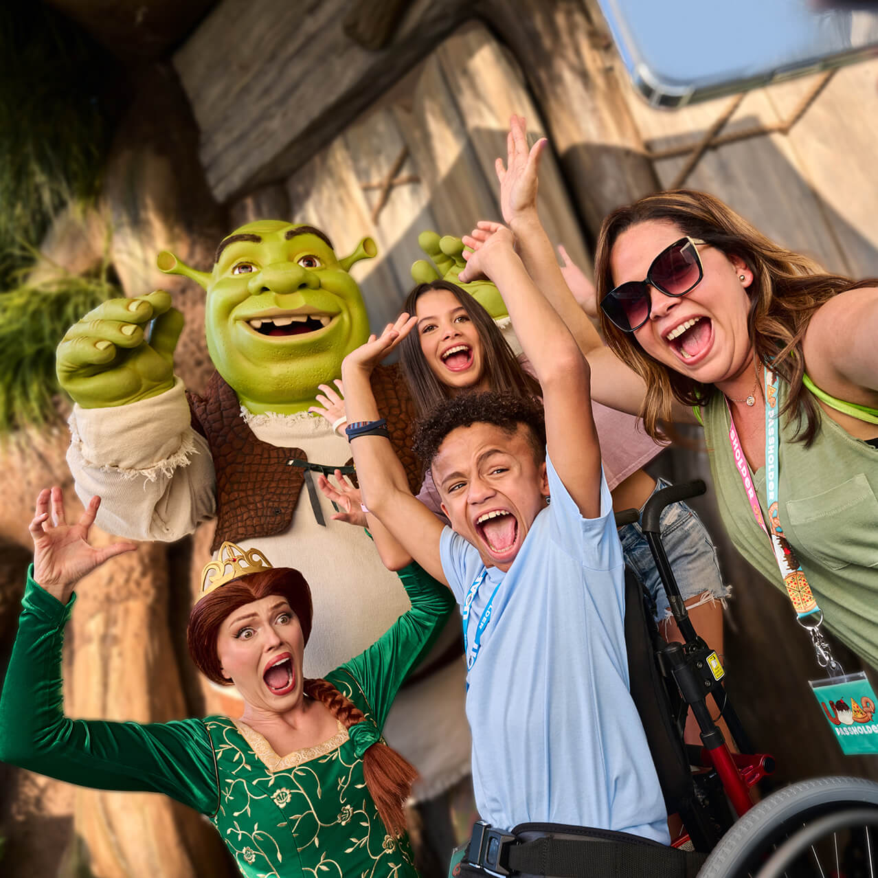 A&nbsp;family&nbsp;of&nbsp;three&nbsp;meeting&nbsp;Fiona&nbsp;and&nbsp;Shrek&nbsp;at&nbsp;Shrek's&nbsp;Swamp&nbsp;Meet&nbsp;in&nbsp;Universal&nbsp;Studios&nbsp;Florida.