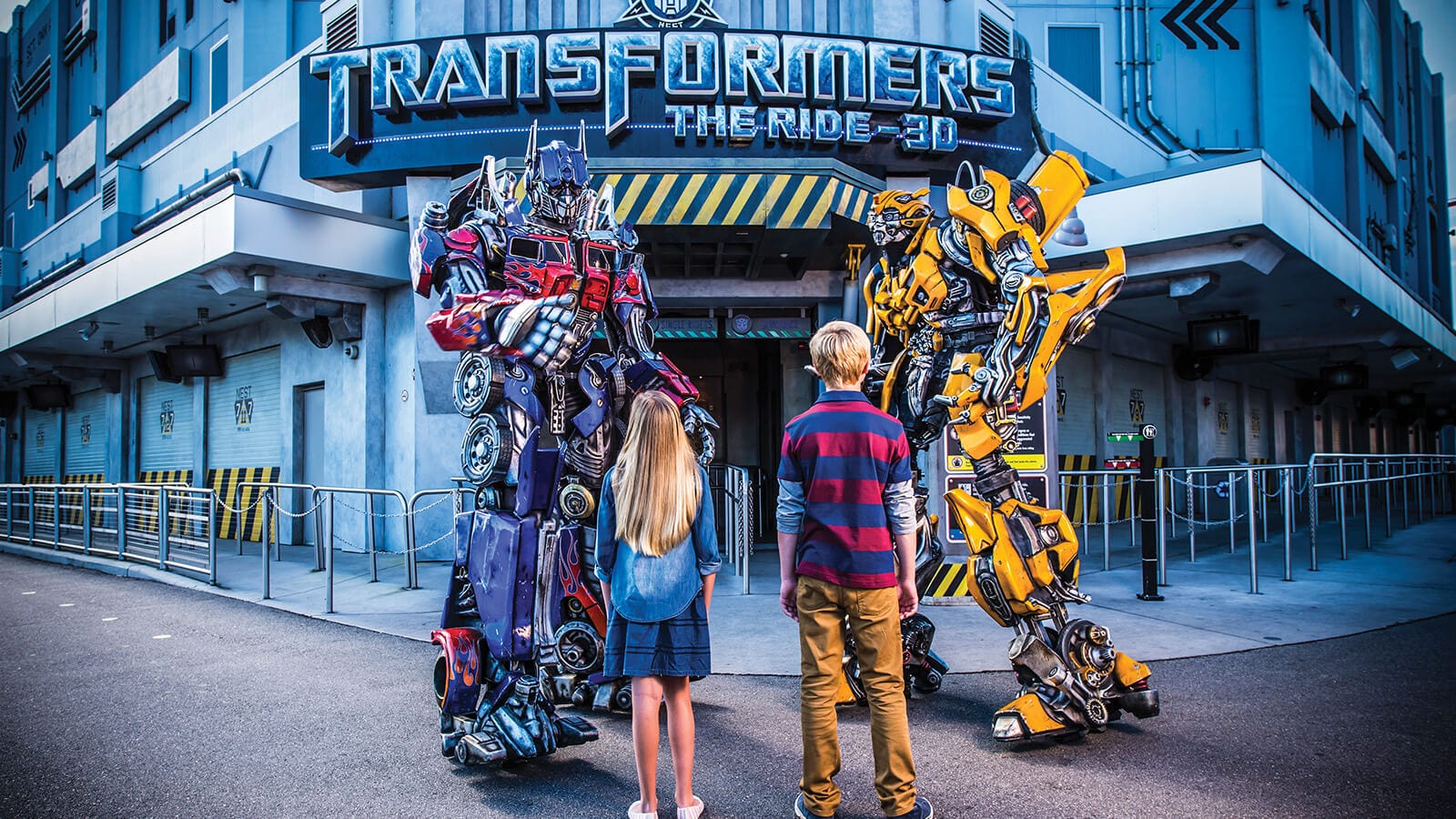 Kids meet Optimus Prime and Bumblebee outside of TRANSFORMERS: The Ride-3D at Universal Studios Florida.