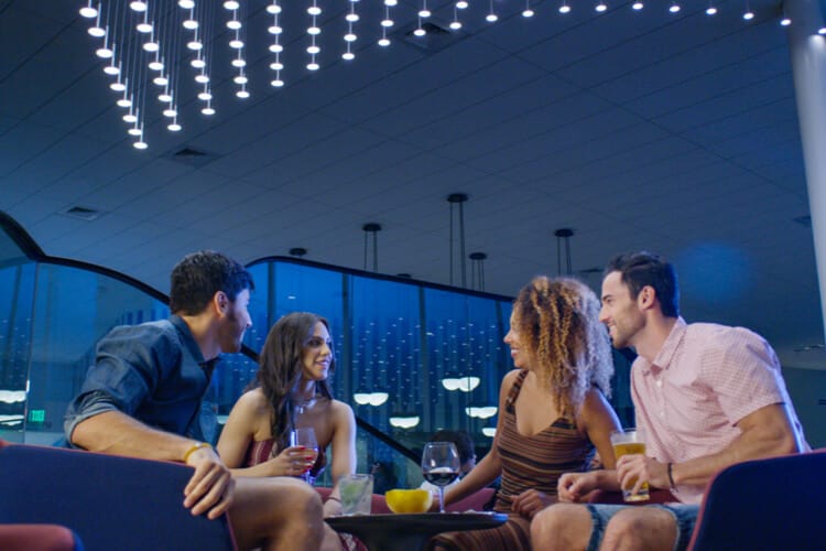 Friends&nbsp;have&nbsp;evening&nbsp;drinks&nbsp;together&nbsp;at&nbsp;BarVentura&nbsp;at&nbsp;Universal.
