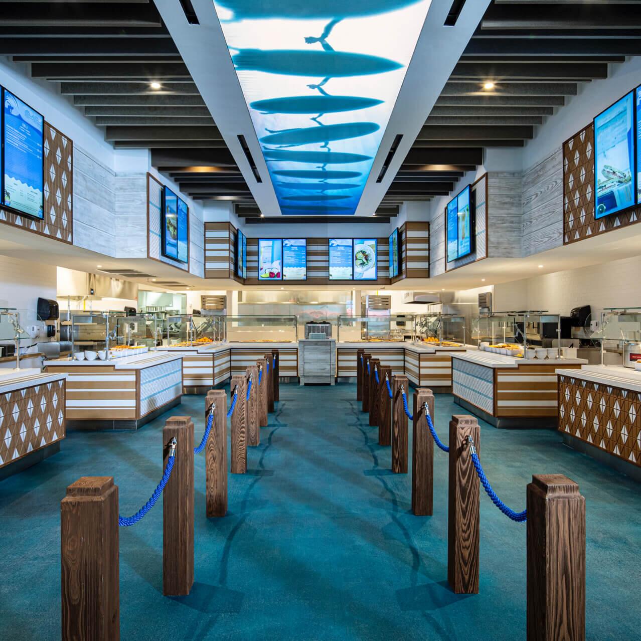 El área de cafetería de Beach Break Cafe en Surfside Inn and Suites.