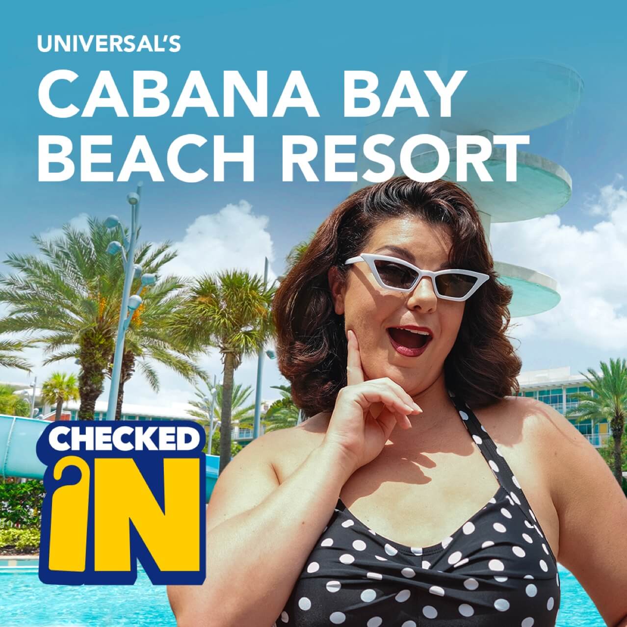 Leyla con traje de baño a lunares y anteojos de sol blancos frente a la piscina en el Cabana Bay Beach Resort.