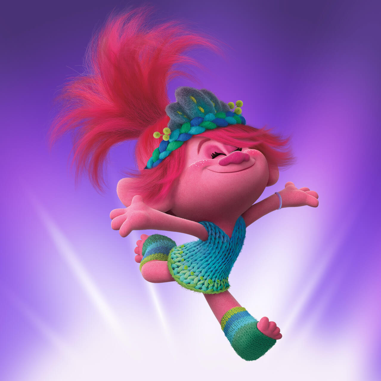 Los Trolls Satin, Poppy y Chenille de DreamWorks en un fondo morado junto a las palabras “Trolls Trollercoaster”.