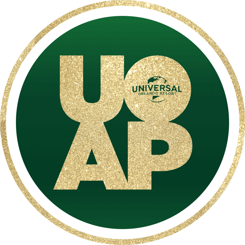 Un logotipo de UOAP dorado brillante en un fondo circular verde, rodeado de un anillo de brillo dorado.