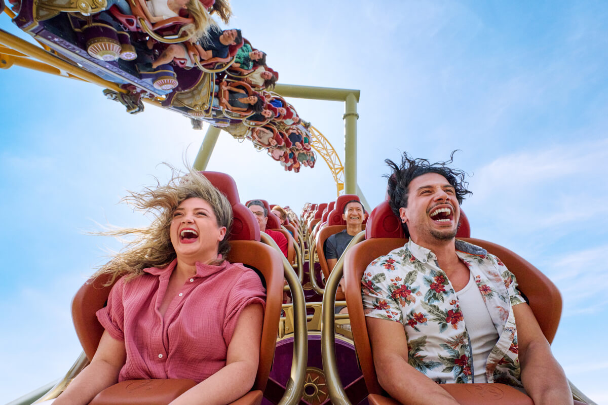Riders scream as they fly through the air on Stardust Racers dual-launch rollercoaster in Celestial Park at Universal Epic Universe.