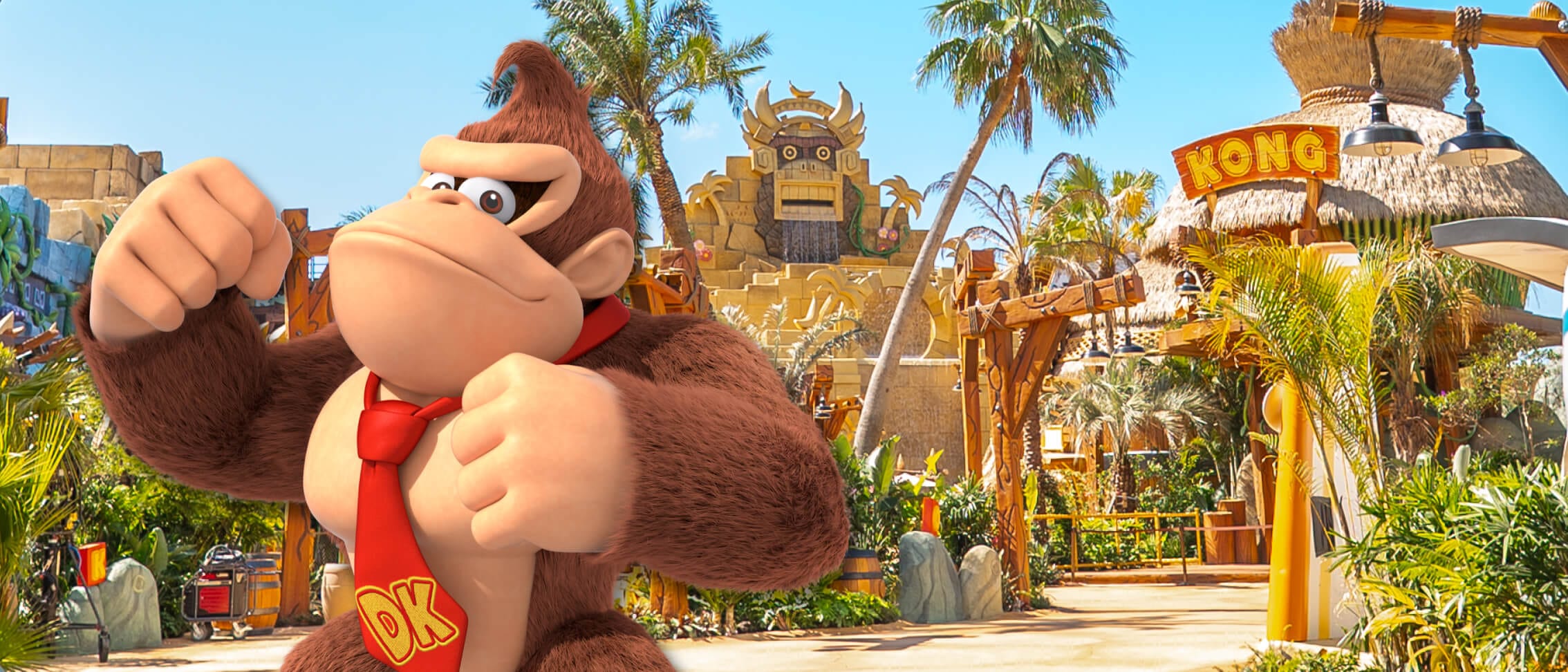 Donkey Kong batendo no peito em frente ao Donkey Kong Country no SUPER NINTENDO WORLD™ no Universal Epic Universe.