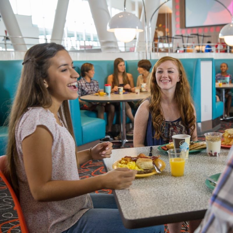 Friends talking inside the Bayliner Diner