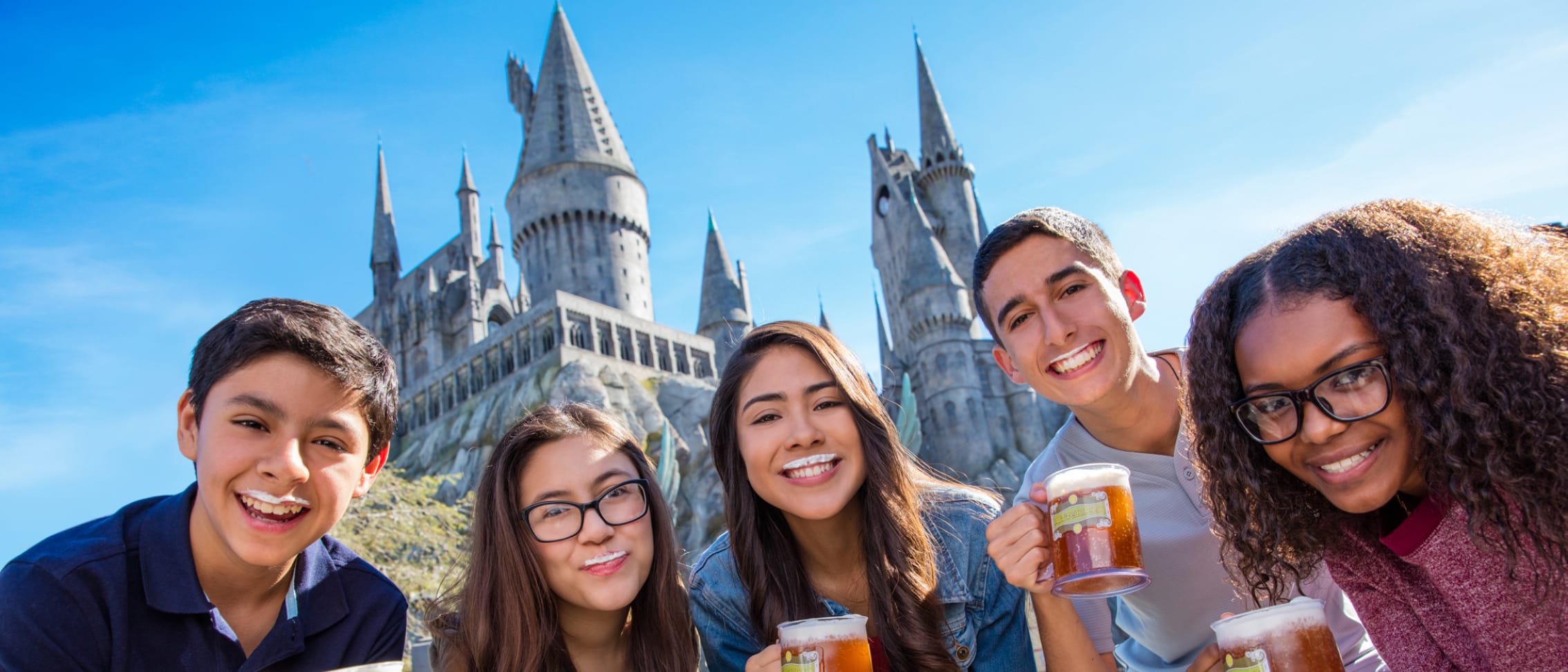 Youth enjoying some Harry Potter Butterbeer