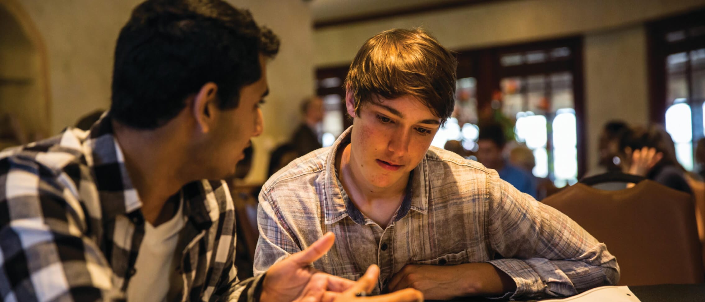 Students sitting at a table in a Business Learning Series program at Universal Orlando Resort