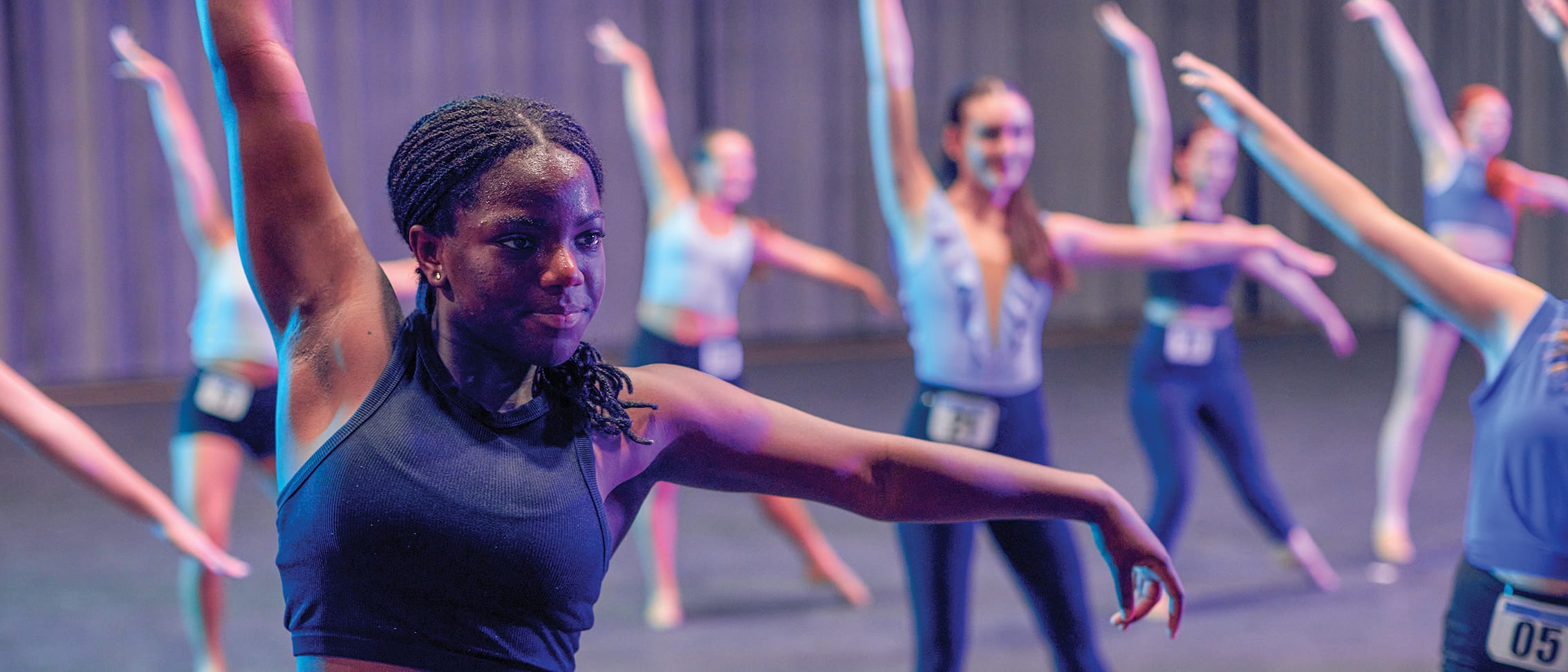 A group of teen dancers practice during a performance workshop in Universal Studios Orlando.