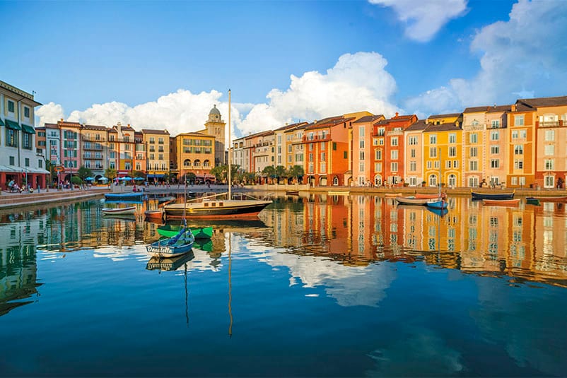 The Harbor Piazza at Universal Orlando's Premier Resort Hotel, Loews Portofino Bay Hotel, featuring Italian architecture and bobbing boats.