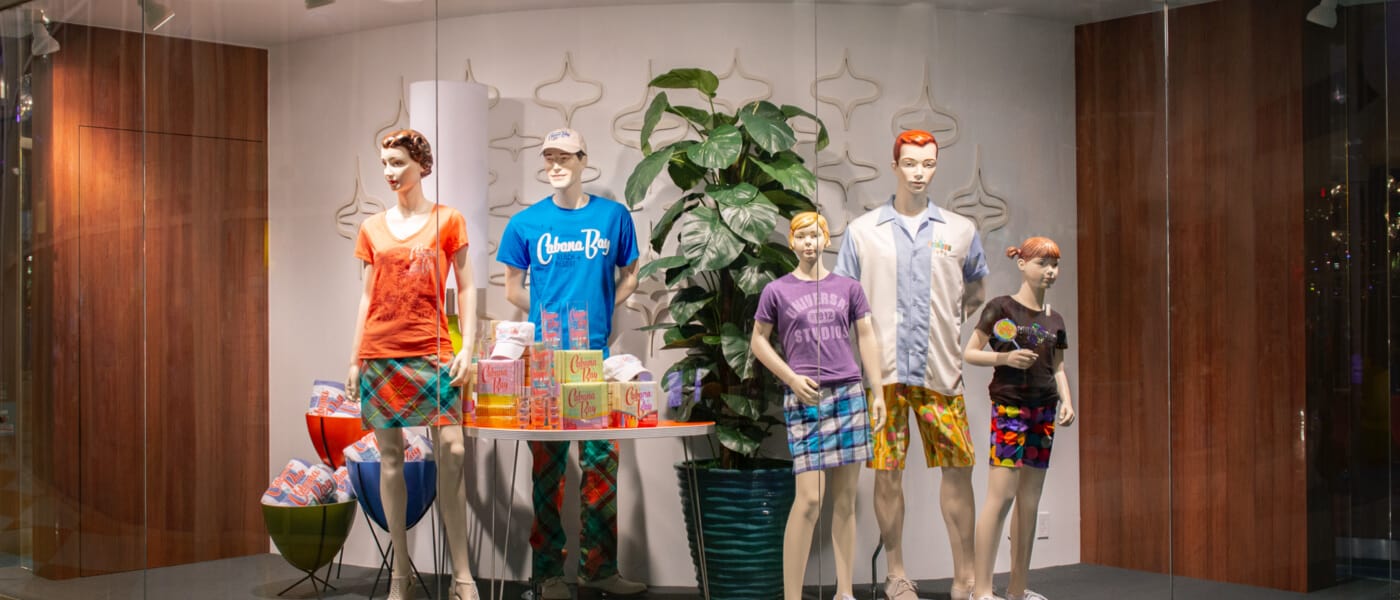 A window display of colorful resort wear available at a gift shop at Universal's Cabana Bay Beach Resort in Orlando.