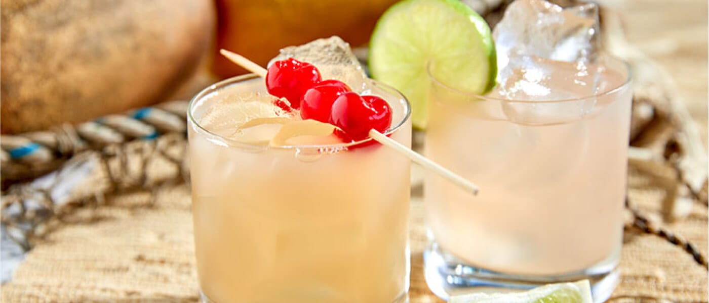 Cocktails garnished with cherries and limes from the Dockside Inn and Suites poolside bar.