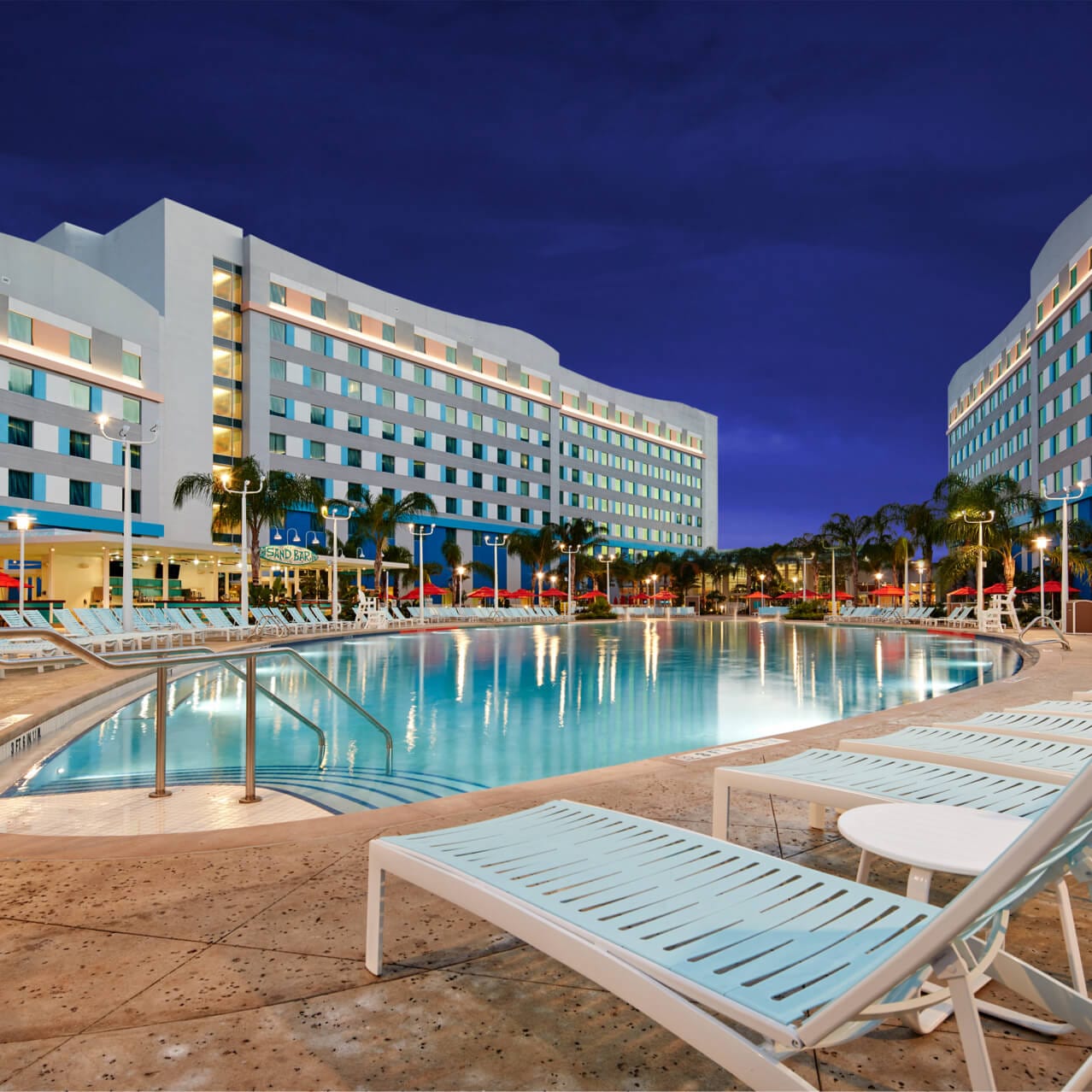The surfboard shaped pool of Universal's Endless Summer Resort - Surfside Inn and Suites. 