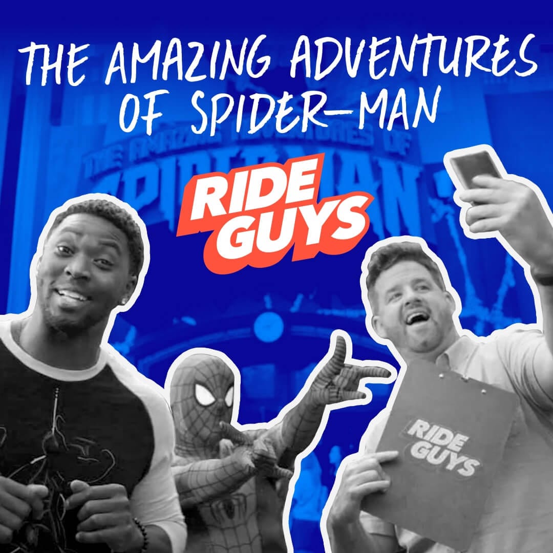 Dylan and Mike with Spider-Man in front of ride entrance.