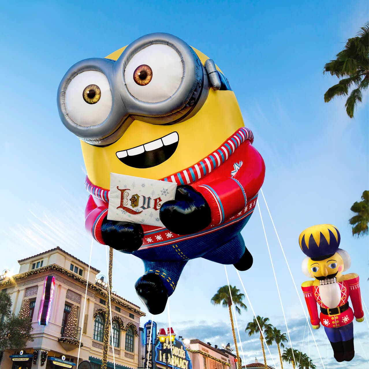 A Minion balloon hovers over Hollywood in the Macy’s Holiday Parade at Universal Studios Florida.