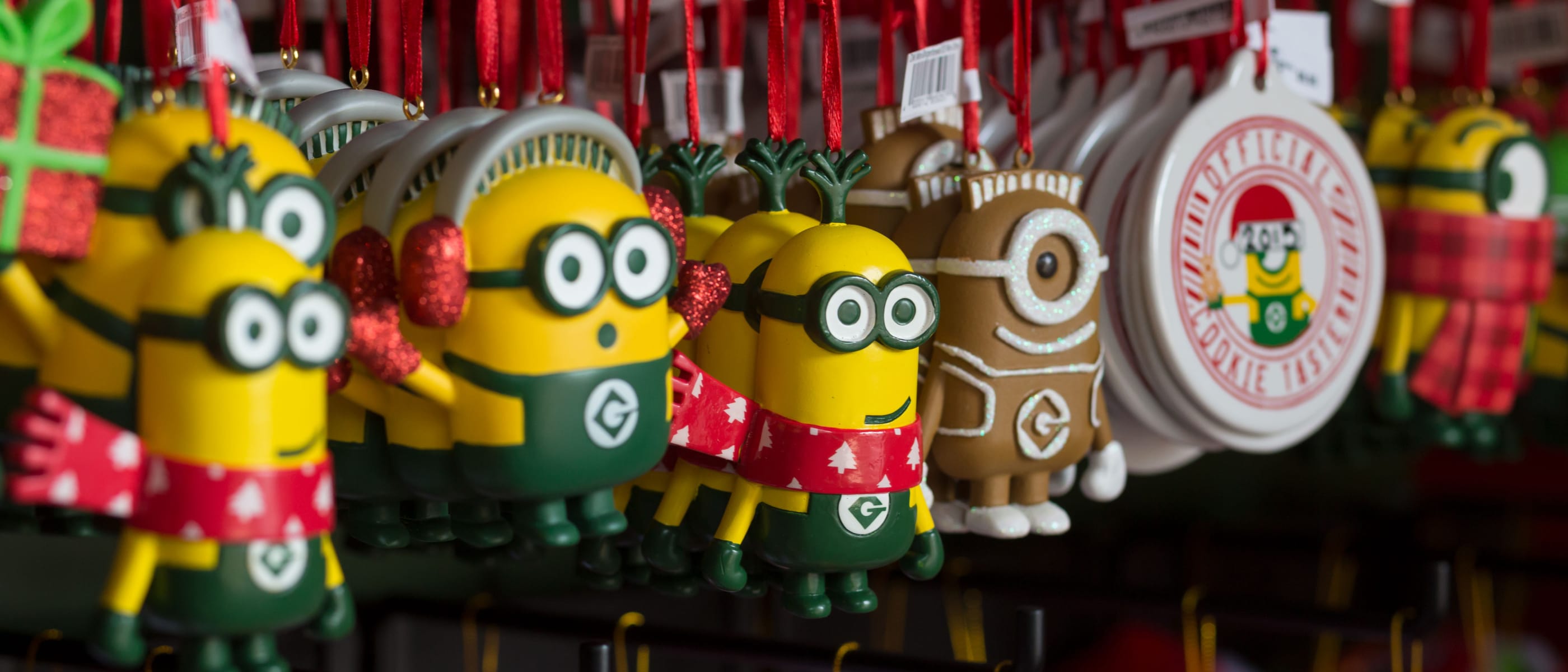 Close up of colorful Minion ornaments on display in the Park Plaza Holiday Shop at Universal Studios Orlando.