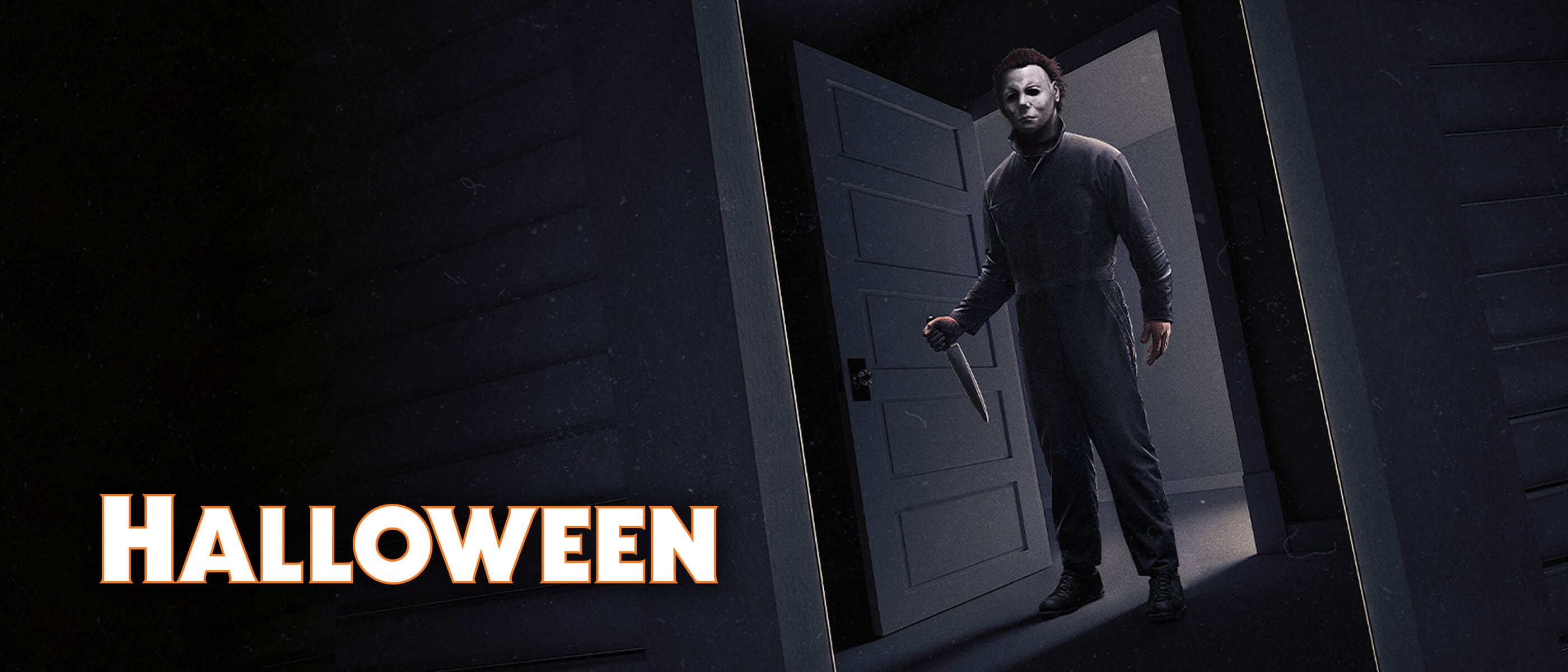 Halloween: The evil, masked Michael Myers character wields a knife in a doorway.