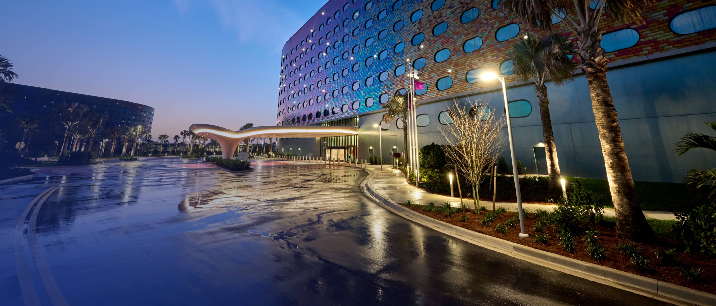 A nighttime exterior of Universal Terra Luna Resort at Universal Orlando Resort.